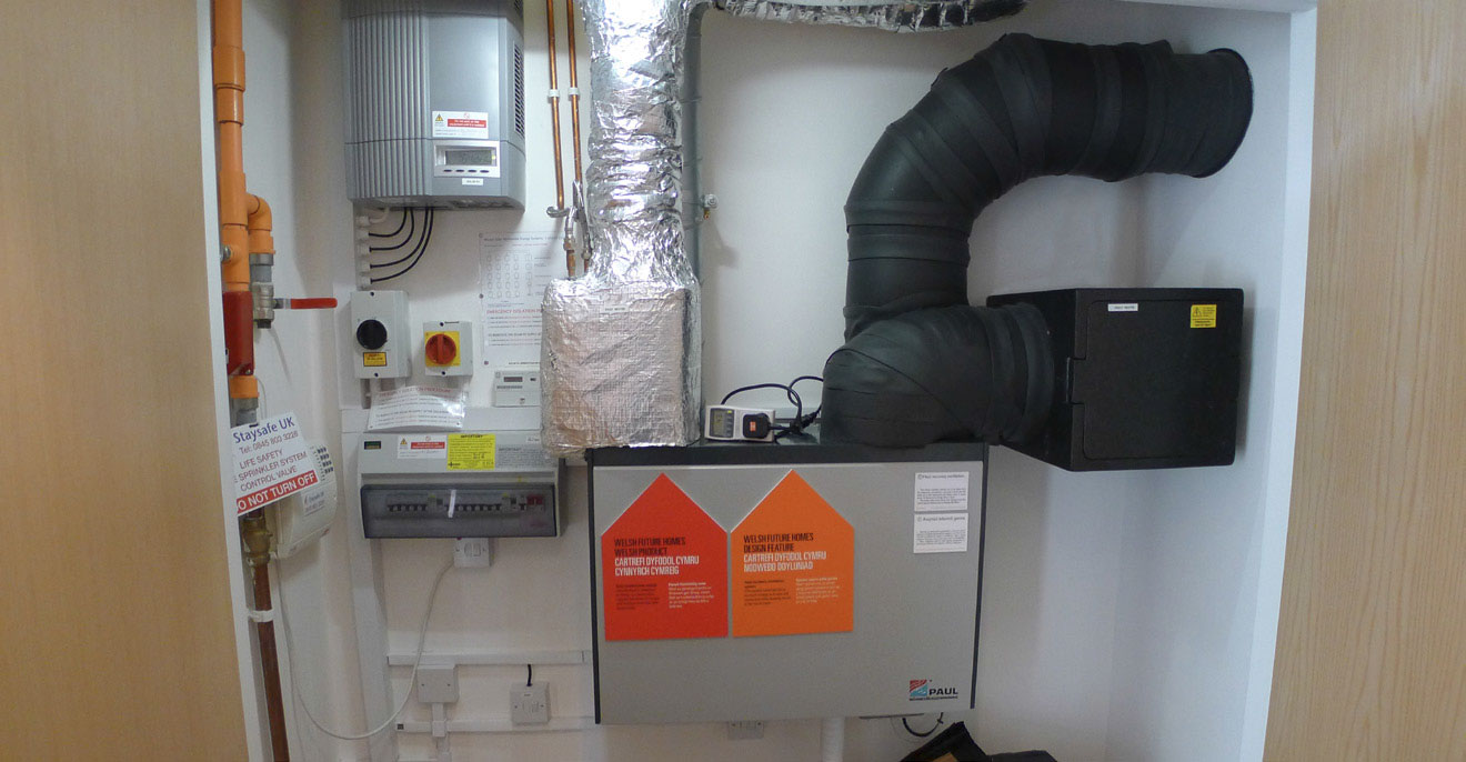Neat and tidy installation of a Paul heat recovery ventilation system and associated equipment in Larch House, a Bere: Architects-designed passive house. Photo by Alan Clarke.