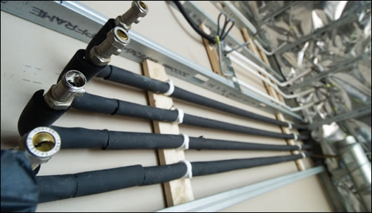 Insulated Pipe Work Insulated pipework distributes heated water from the group heating system throughout the building