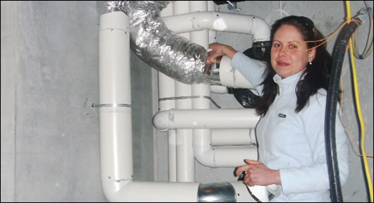 Approved Proair installer Jana Hutirova puts the finishing touches on a heat recovery ventilation installation in a house in Galway Approved Proair installer Jana Hutirova puts the finishing touches on a heat recovery ventilation installation in a house in Galway