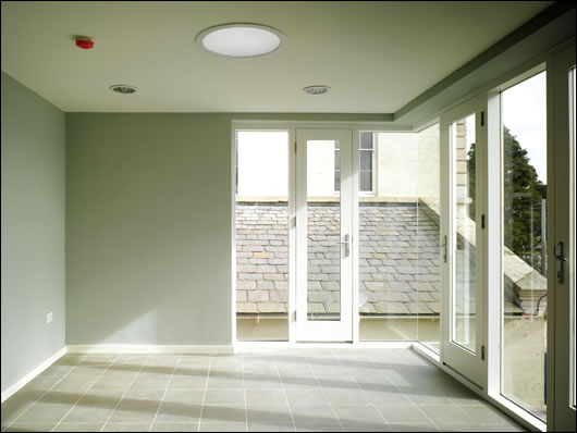 A south facing sunroom in the east extension is one of many communal space throughout the buildings A south facing sunroom in the east extension is one of many communal space throughout the buildings