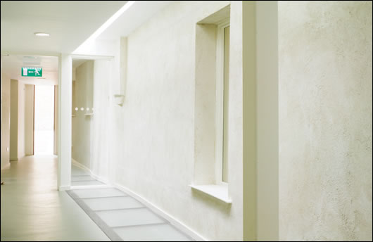 A light-well in the north extension brings sunlight to the floors below, helping to illuminate the interior of the building A light-well in the north extension brings sunlight to the floors below, helping to illuminate the interior of the building