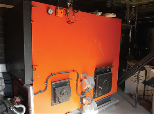 A 92 per cent efficient Heizomat wood pellet boiler heats both new and old buildings A 92 per cent efficient Heizomat wood pellet boiler heats both new and old buildings