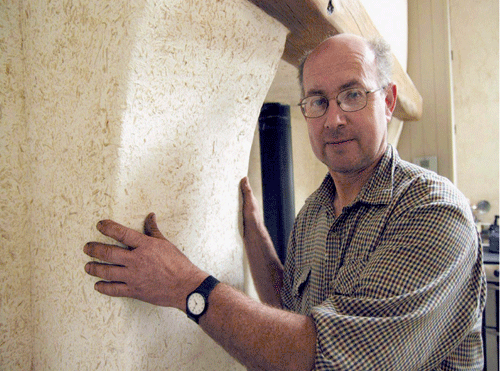 Robert Longwell, hemp farmer standing in his Hempire plastered traditional cottage Robert Longwell, hemp farmer standing in his Hempire plastered traditional cottage